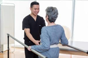 A therapist helping a resident at Stoney Point