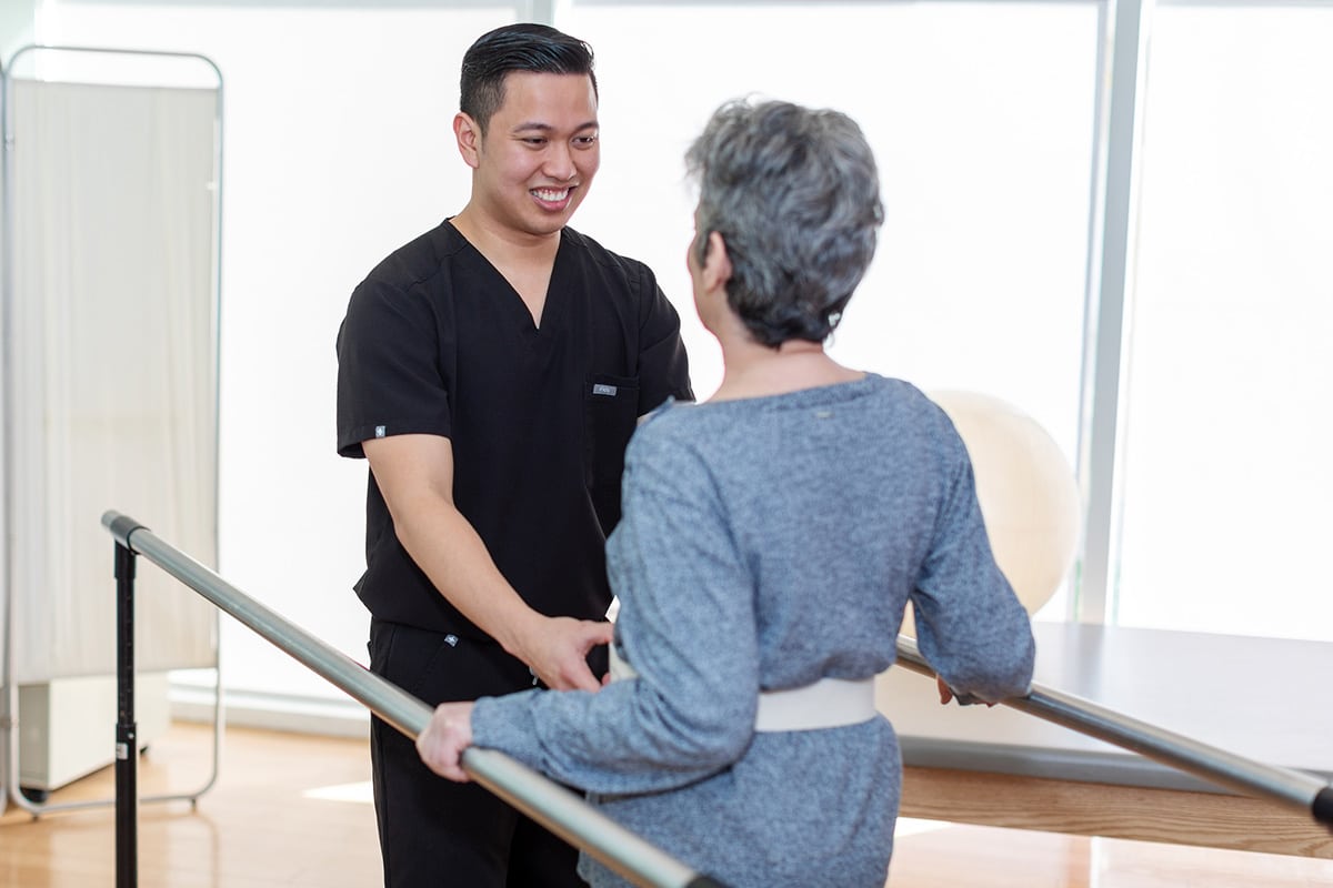 A therapist helping a resident at Stoney Point