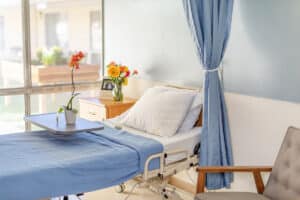 A resident's room at Stoney Point with flowers