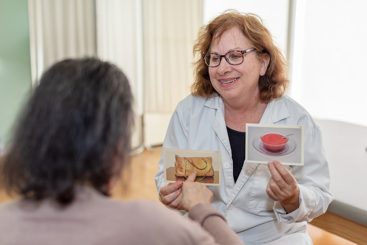A therapist helping a resident at Stoney Point